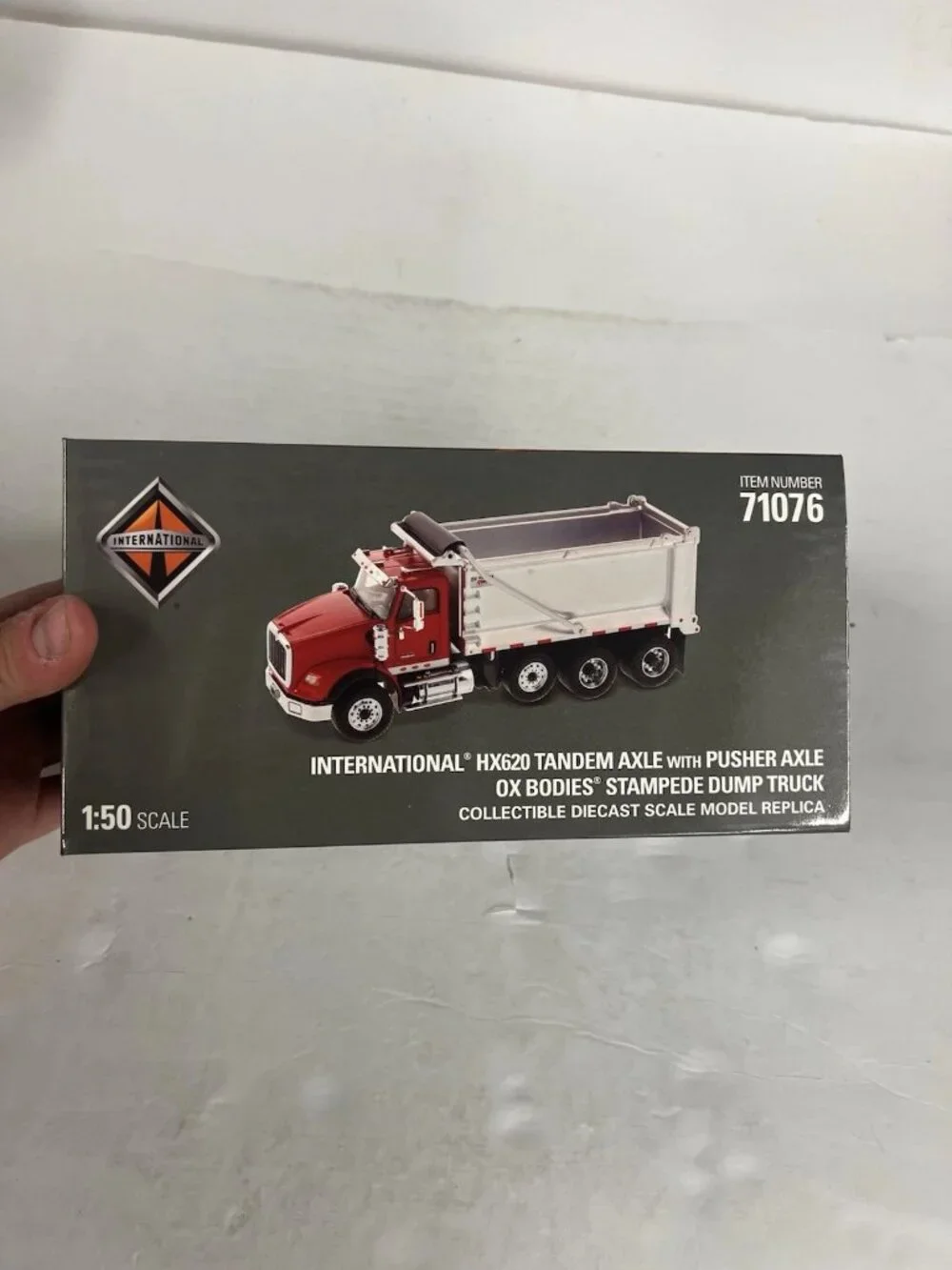 Diecast Masters International HX620 With Ox Body Dump truck 71076 1:50 scale